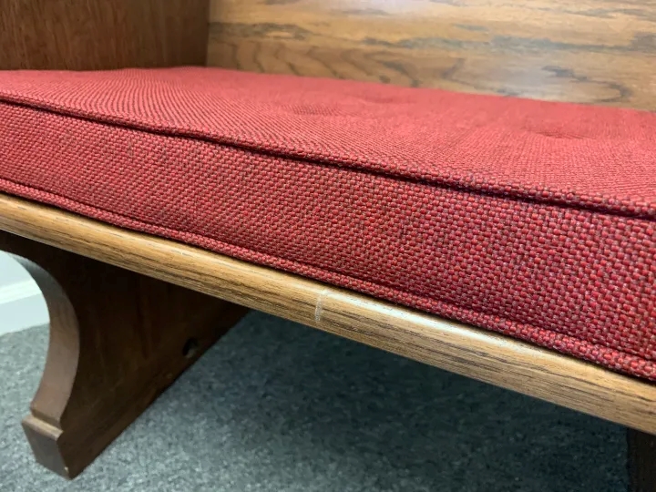 Front view of a church pew cushion from Woods Church Interiors