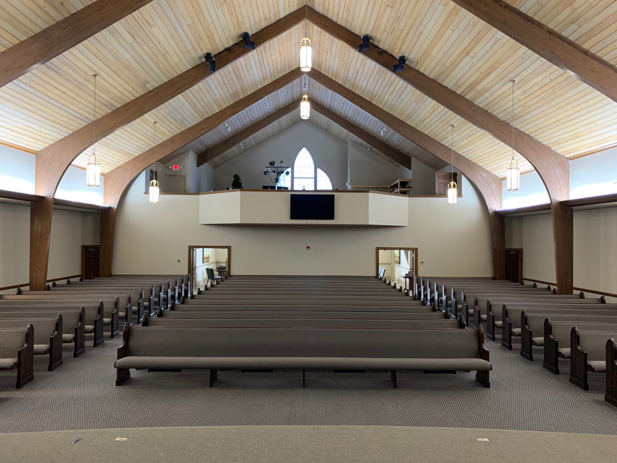 Front view of a Kivetts New Pew Installation in Macon, Georgia by Woods Church Interiors