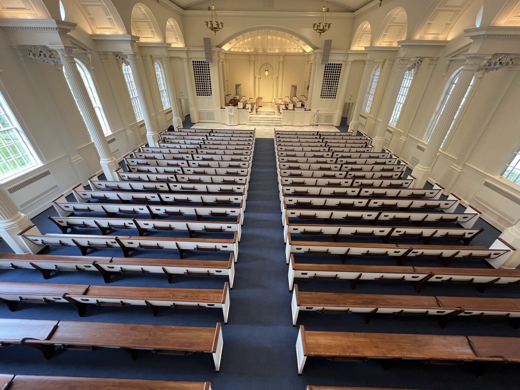 balcony view at Trinity Presbyterian in Atlanta, Georgia after the pews were refinished by Woods Church Interiors