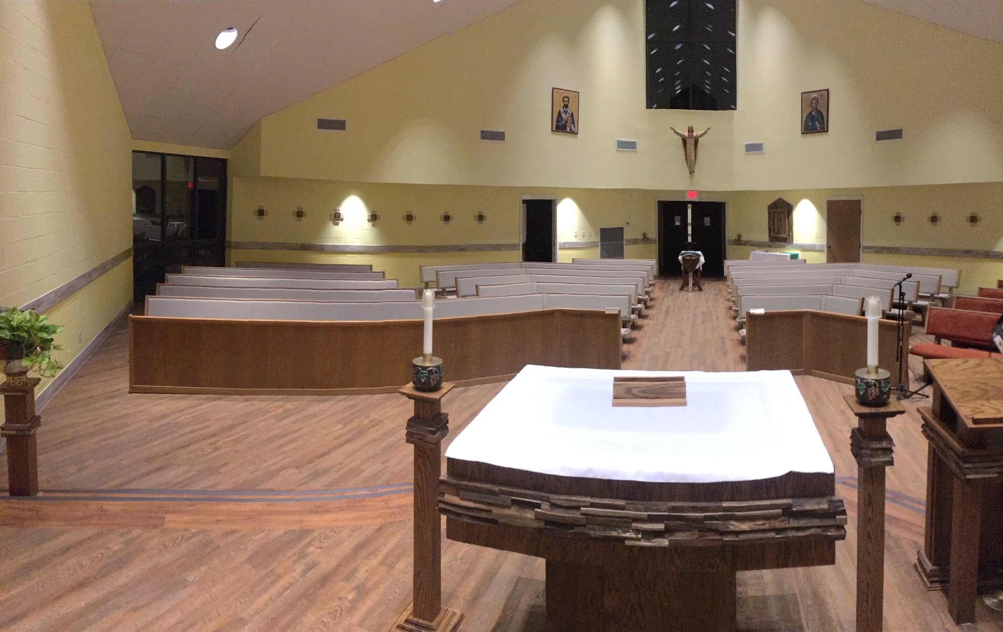 Pew upholstery completed at St. Gregory the Great Catholic in Senatobia, Mississippi by Woods Church Interiors - 8