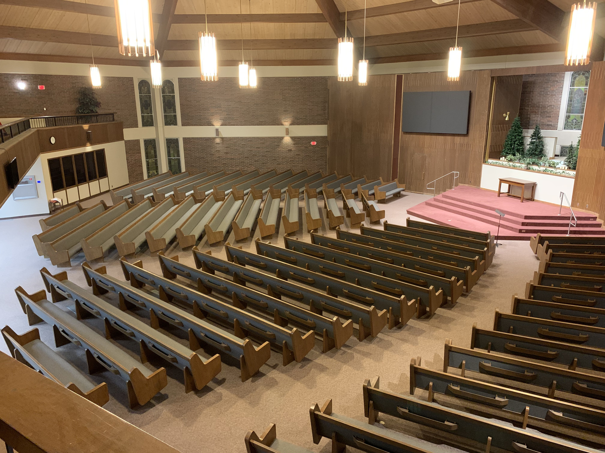 Right Aerial view of church pew upholstery Wichita Kansas performed by Woods Church Interiors nationwide pew upholstery service