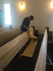 Pic illustrating cost to get our church pews upholstered on site
